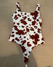 altar’d state cow print body suit size M