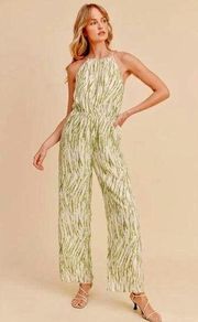 Green and white abstract print halter jumpsuit with pockets size medium