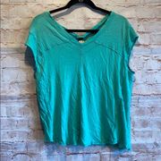 Free People  Teal cap sleeve v neck shirt distress