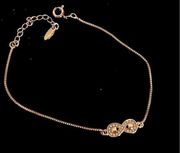 Gold Tone Infinity Symbol Bracelet