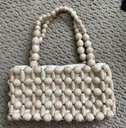 Cult Gaia shoulder bag in off white with twine beaded detail