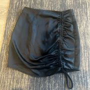Black satin motel rocks mini skirt