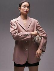 Topshop Tailored oversized blazer with twisted sleeve in pink Size 6