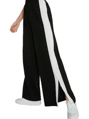 Black ivory full leg dress pants by Gianni Bini, side stripe split hem vent