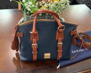 Value of $398  Dillen Navy Florentine Satchel bag with dust bag