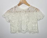 Maniju cream ivory lace crop top ribbon bow
Size XS
New with tags