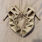 Fergalicious Heartthrob faux suede lace up zipper back heeled sandals. EUC