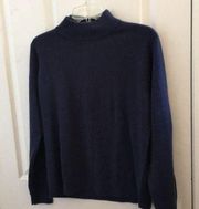 Ladies navy drapers and Damon’s acrylic sweater l