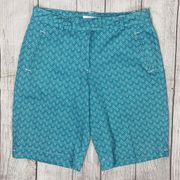 women size 2 dry fit golf shorts w/diamond pattern teal & white