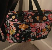 Vera Bradley bag w/ floral design.Has 4 different compartments.New with out tag.