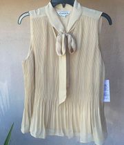 bow tie neck sleeveless flowy peplum cream blouse top