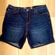 Seven7|| Dark blue jean short with stitching on back pockets.