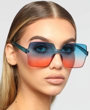 Heartbreaker Sunglasses….Color: Blue/Orange