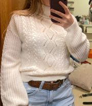 White knit turtleneck sweater