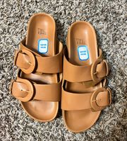 Women’s  cognac slide sandals. Size 7w