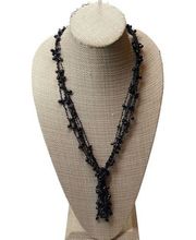 Relativity Black multi stranded knotted pendant Beaded necklace