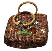 Espirit lined wicker handbag with ring handles and floral design