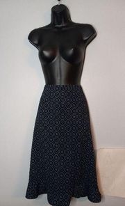 Amanda Smith black and blue skirt