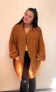 Urban Outfitters oversized knit sweater with pockets size Small‎