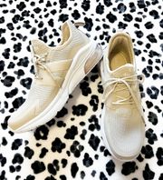 beige running shoes