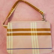 Small Striped Wristlet With Zipper top closure.