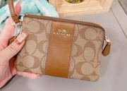 COACH CORNER ZIP WRISTLET IN SIGNATURE COATED CANVAS WITH LEATHER STRIPE/NWT