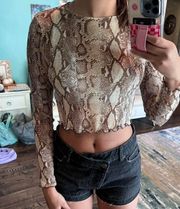 never worn  leopard print sheer top