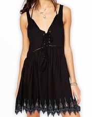 Somedays Lovin Beaming Soft Black Mini Sundress Sleeveless Lace Up Tassel Tie