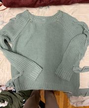 Macy’s sweater with ribbon detailing 