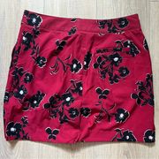 Izod golf women’s skort. Black/red floral. Size 6