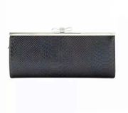 INC  Carolyn Exotic Clutch