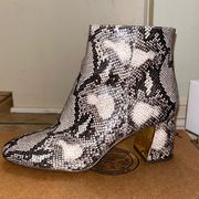 XOXO snakeskin booties. SZ 7.5