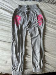 Adika grey and pink dragon sweatpants. Size Small