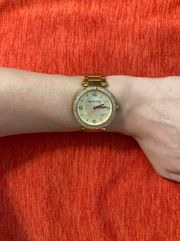 Woman’s gold tone quartz movement  wrist watch!