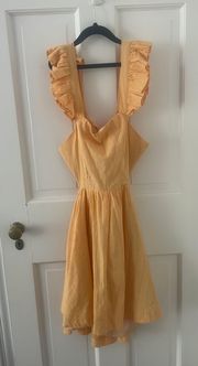 Orange ruffled sleeve dress