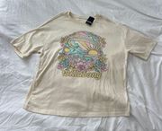 graphic tee  Size XS Condition: NWT Color: pale yellow  Details : - Graphic tee  - Comfy  - Oversized