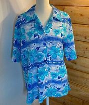 Tan Jay Hawaiian shirt.  Size 10.  Tropical island.  Mixture of blues colors.