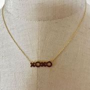 Gold tone XOXO pendant dainty necklace