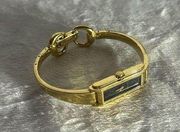 Vintage Gold Gucci Watch with Black Face (needs battery)
