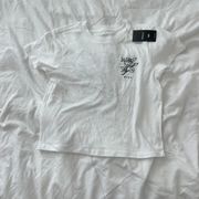 baby tee  Size XS Condition: NWT  Color: white  Details : - Graphic tee