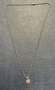 , silver pendant and 24” necklace