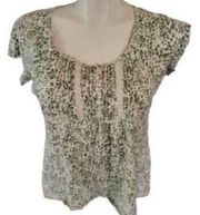 EDDIE Bauer size large cream colored top with green flower print