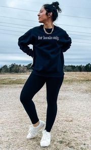 “for locals only.” Crewneck Sweatshirt in Black