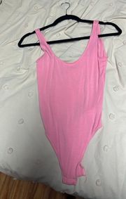 pink body suit 