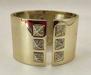 Victoria's Secret gold tone and rhinestone wide bangle bracelet