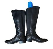 Ann Taylor Loft black leather riding boot with stretch band in back. Pull on siz