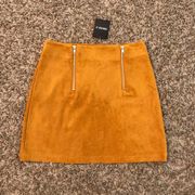 Forever 21  NWT faux suede, mustard color, double front zip, short mini skirt