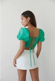 green puff sleeve lace up top