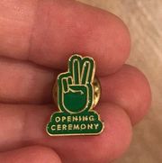 4/$25 Opening Ceremony Pin Green Peace Sign