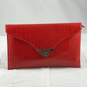 Shiny patent Red Snakeskin snap clutch